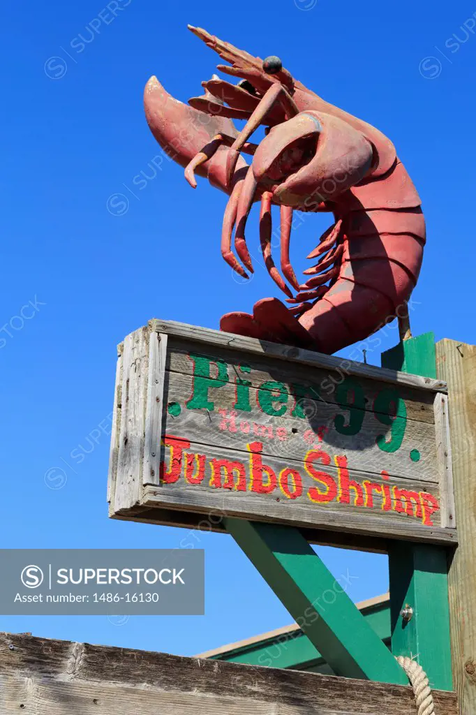Low angle view of a signboard at Pier 99 restaurant, North Beach, Corpus Christi, Texas, USA