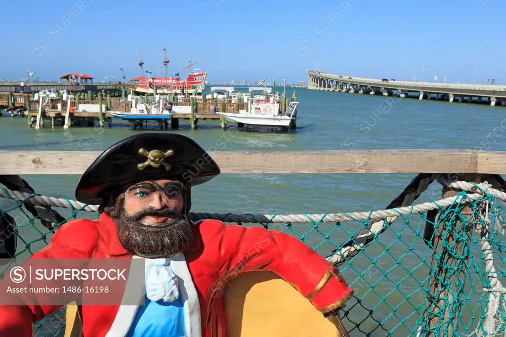 Statue of pirate with a harbor in the background, Port Isabel, Texas, USA