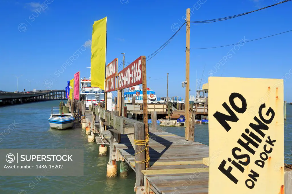 No Fishing sign on a dock, Dolphin Dock, Port Isabel, Texas, USA