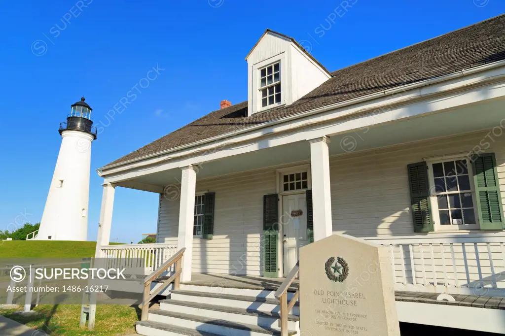 Building with a lighthouse in the background, Point Isabel Lighthouse, Port Isabel, Texas, USA
