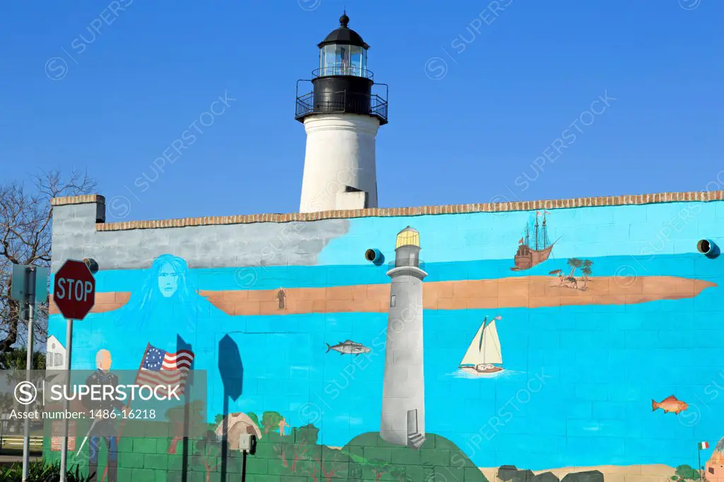 Mural on the wall with a lighthouse in the background, Point Isabel Lighthouse, Port Isabel, Texas, USA