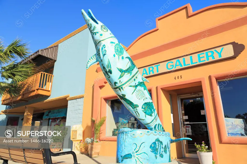 Sculpture of a dolphin outside an art gallery, Port Isabel, Texas, USA