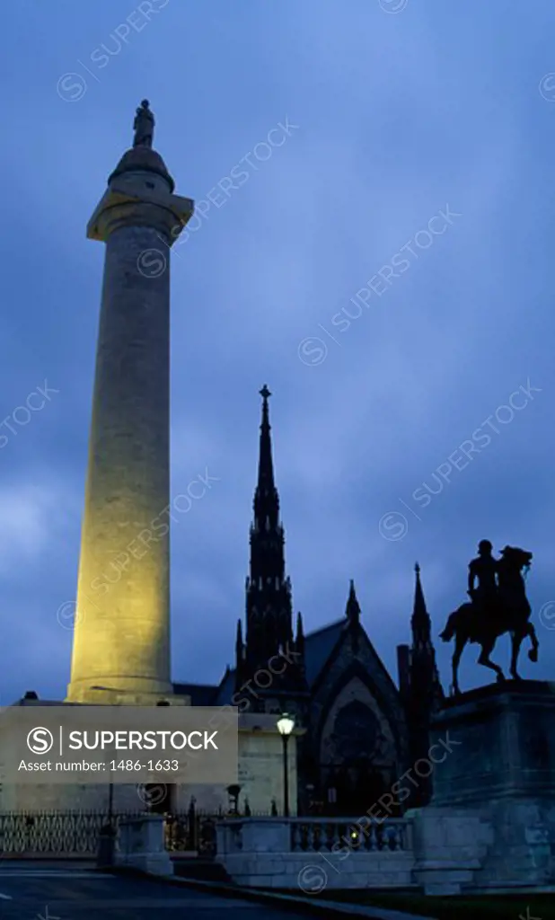 USA, Maryland, Baltimore, Washington Monument illuminated at dusk