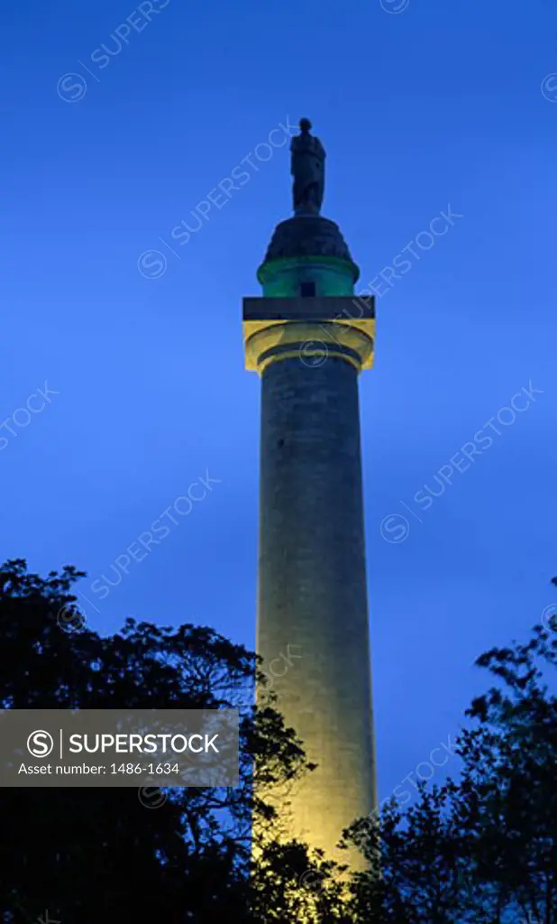 USA, Maryland, Baltimore, Washington Monument illuminated at dusk