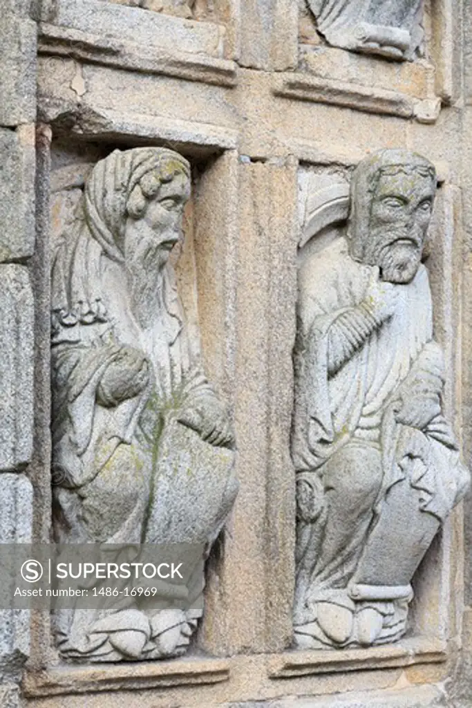 Carving detail on cathedral wall in Plaza Quintana, Santiago de Compostela, Galicia, Spain