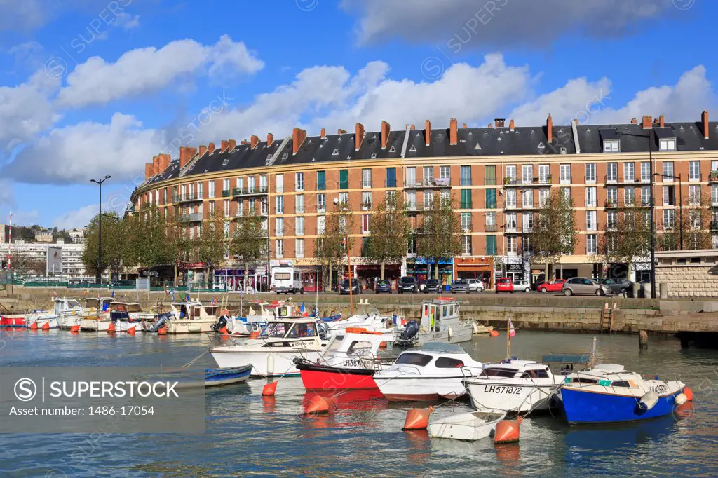 Boats in the sea with a building in the background, Saint Francois Quarter, Le Havre, Normandy, France