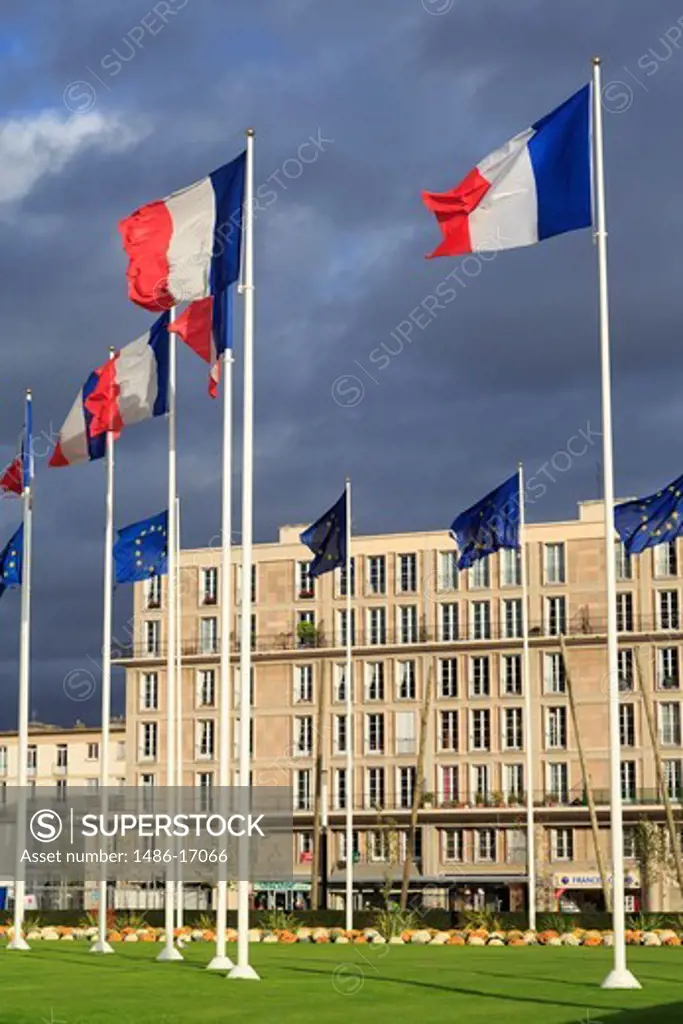 French flags fluttering outside a City Hall, Le Havre, Normandy, France