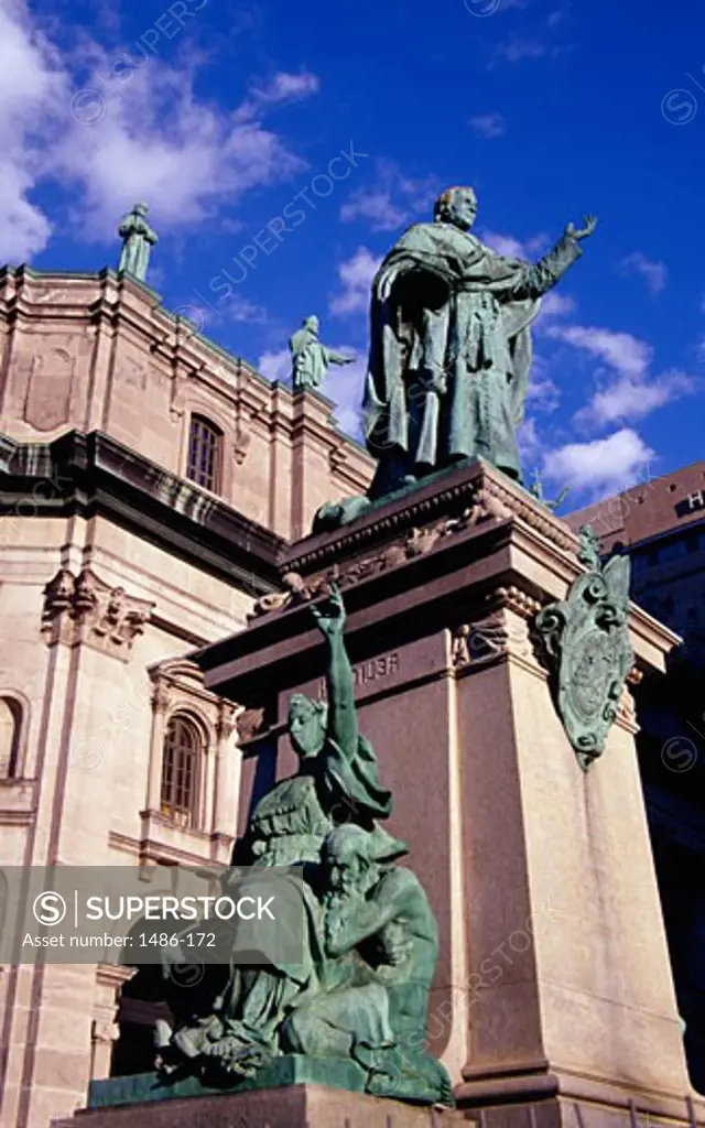 Statues with a cathedral in background, Mary Queen of the World Cathedral, Montreal, Quebec, Canada