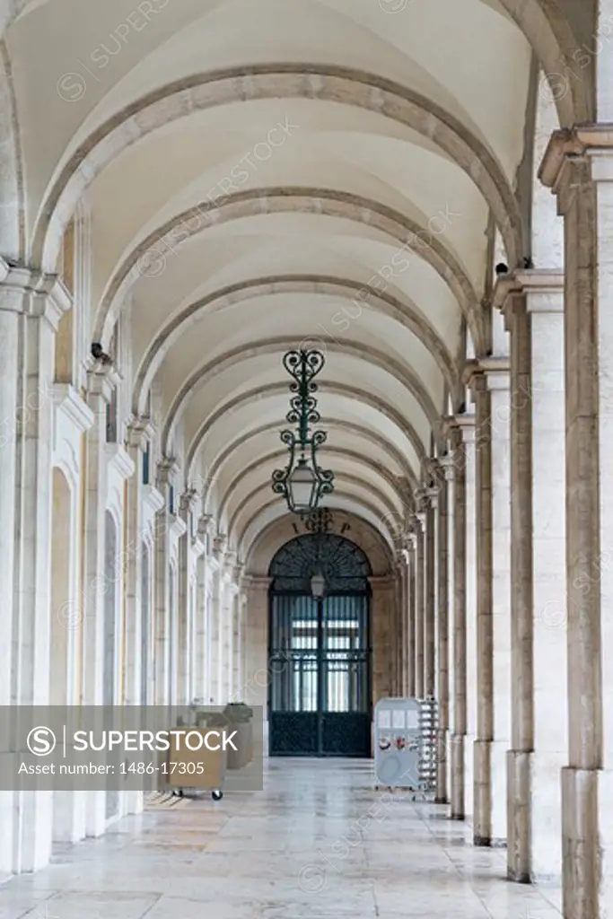 Portugal, Lisbon, Baixia District, Colonnade in Praca do Comercio