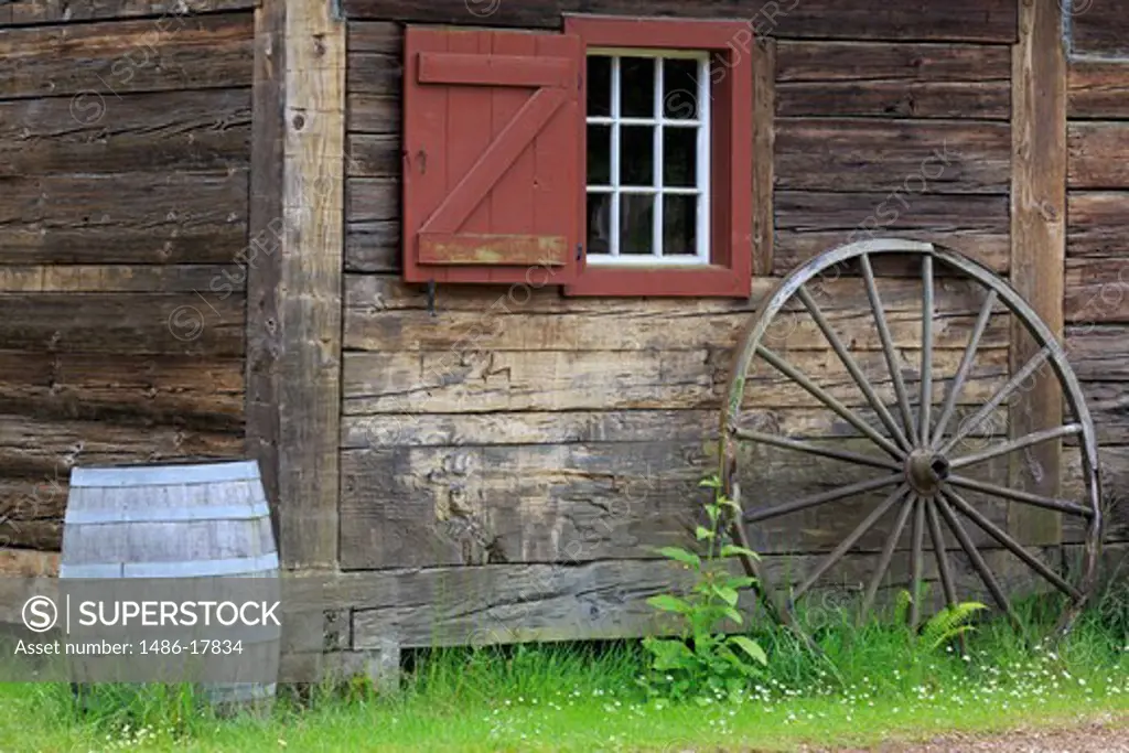 Wagon wheel outside a museum, Fort Nisqually, Point Defiance Park, Tacoma, Washington State, USA