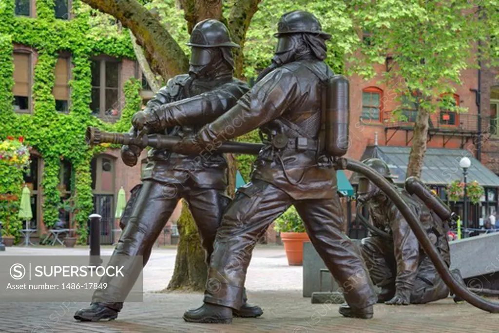 Statues at Fallen Firefighters Memorial, Occidental Park, Pioneer Square, Seattle, King County, Washington State, USA