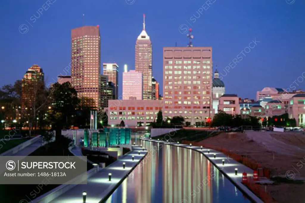 Buildings lit up at dusk in a city, Indianapolis, Indiana, USA