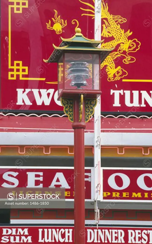 Canada, British Columbia, Victoria, Chinatown, street lamp and commercial signs