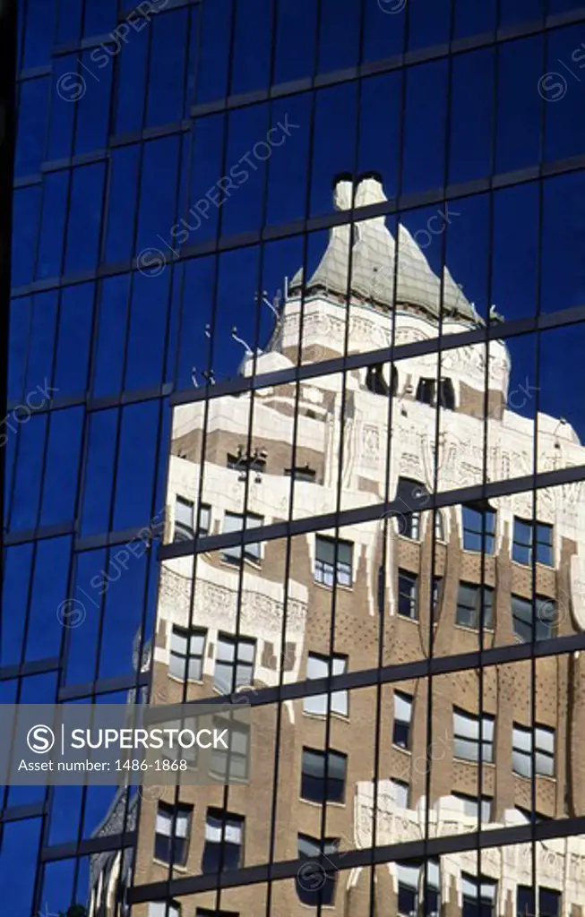 Canada, British Columbia, Vancouver, building reflecting in office building