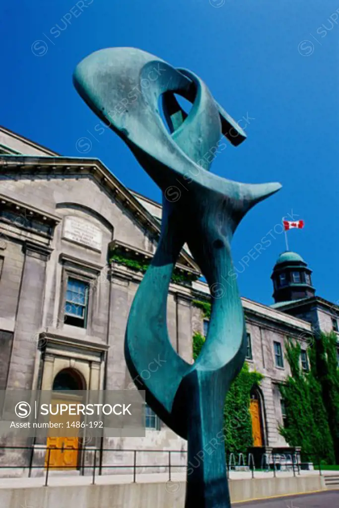 Low angle view of a sculpture in front of a building, Exaltation Sculpture, Montreal, Quebec, Canada