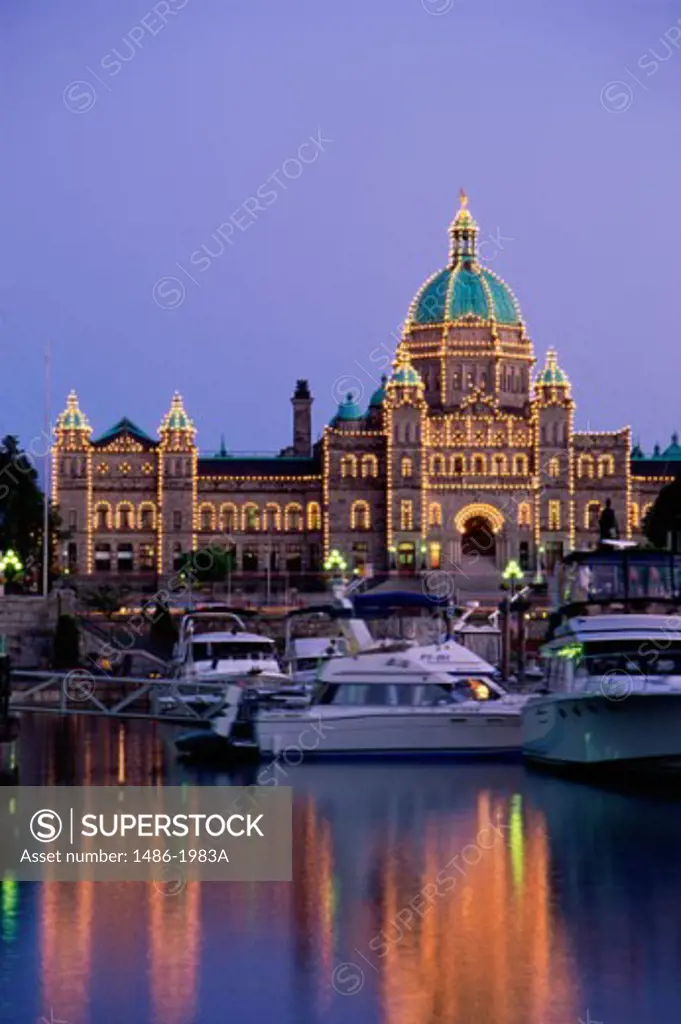Boats docked at a port near the Parliament Buildings, Victoria, British Columbia, Canada