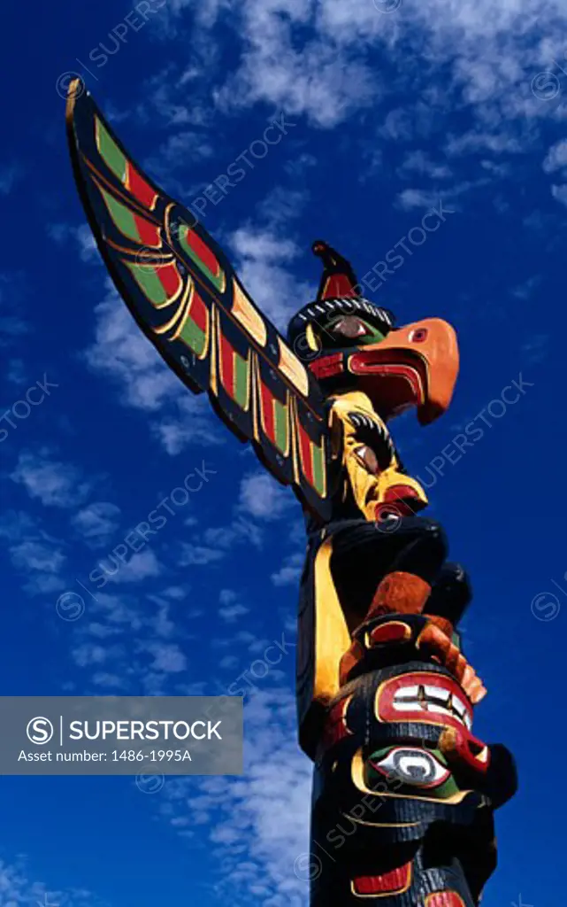 Low angle view of a totem pole, Thunderbird Park, Victoria, British Columbia, Canada