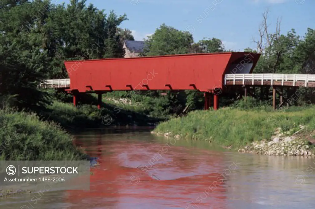 Covered bridge over a stream, Roseman Covered Bridge, Winterset, Iowa, USA