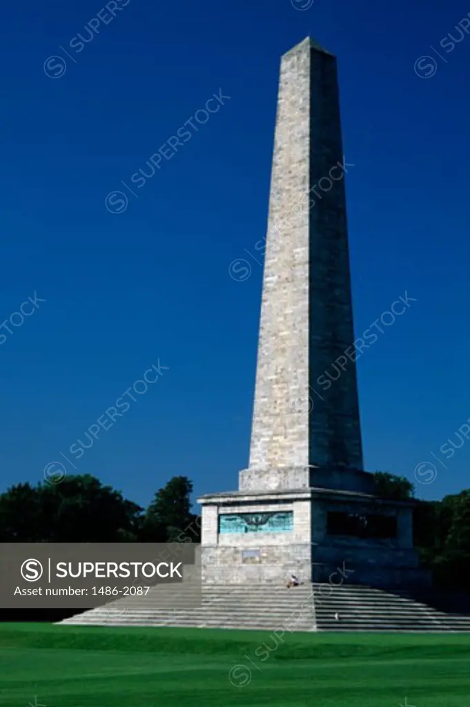 Person sitting on the steps of a monument, Wellington Monument, Dublin, Ireland