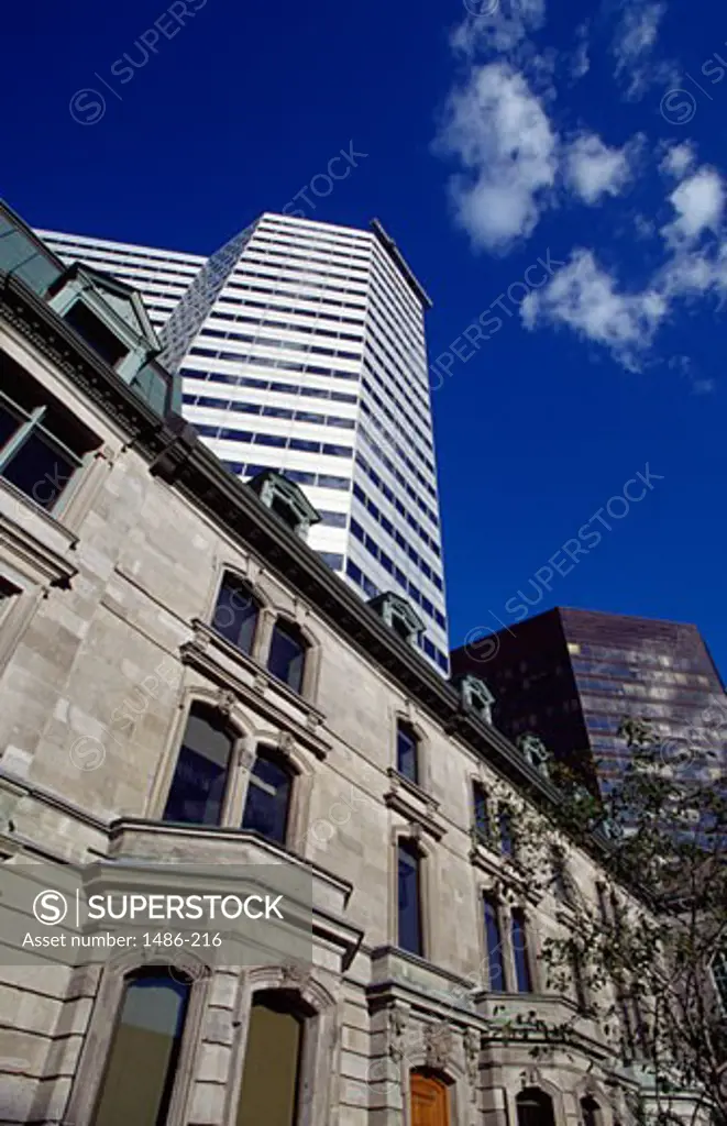 Low angle view of buildings in a city, Montreal, Quebec, Canada