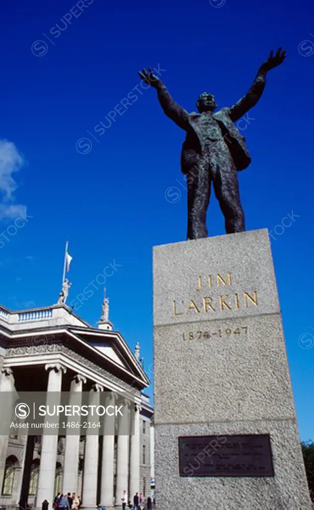 Low angle view of a statue in front of a building, Jim Larkin Statue, Dublin, Ireland