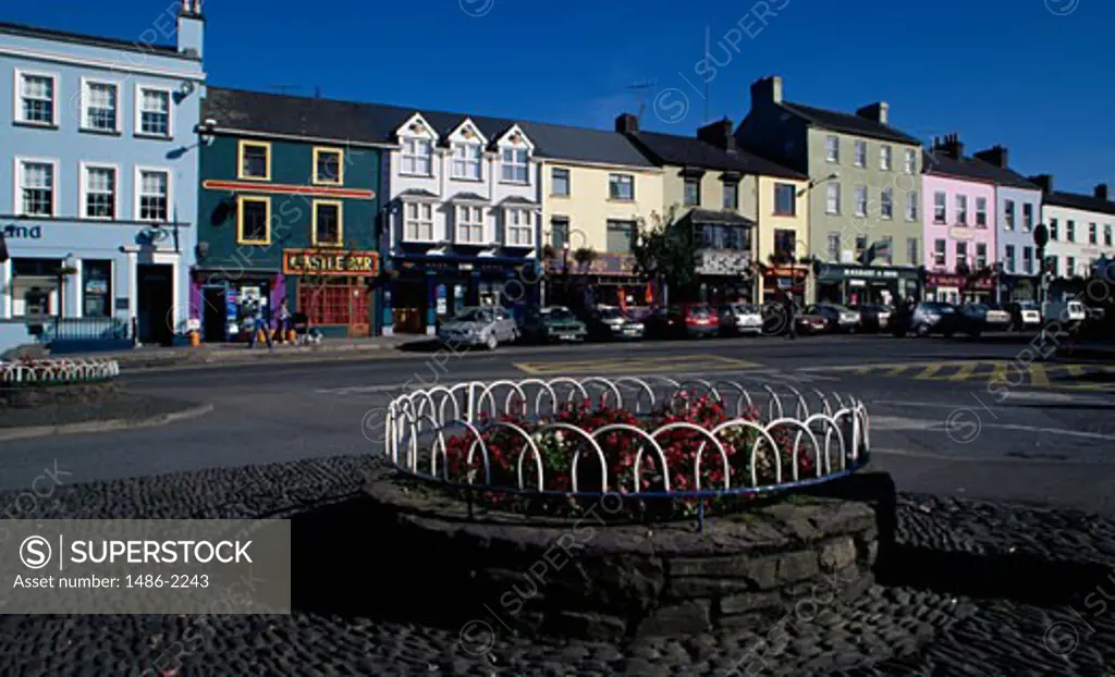 Buildings along a road in a market, Macroom, County Cork, Ireland