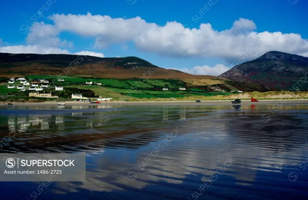 Reflection of hill and clouds in water, Inch Beach, County Kerry, Ireland
