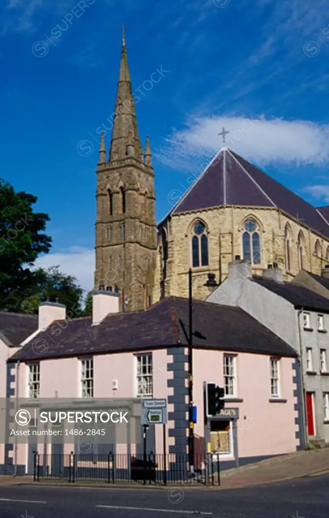 Houses in front of a cathedral, Protestant Cathedral, Downpatrick, County Down, Northern Ireland