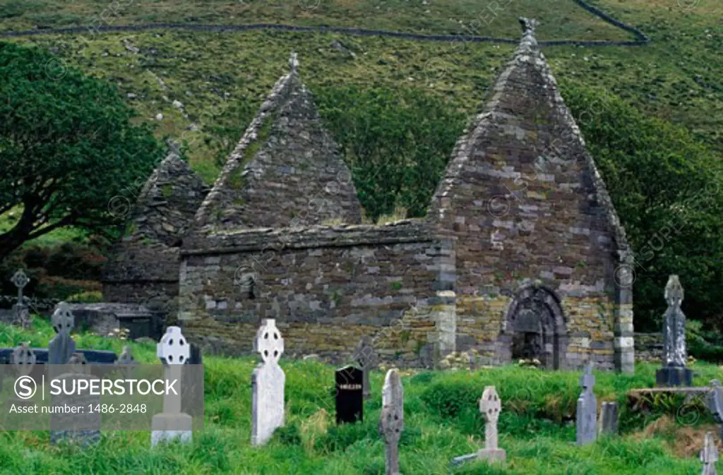 Graves at a church, Kilmalkedar Romanesque Church, Kilmalkedar, Ireland