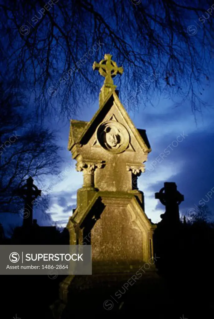Low angle view of a tombstone in a cemetery, St. Finbarr's Cemetery, Cork, County Cork, Ireland