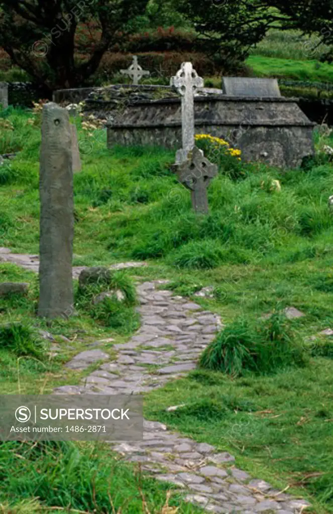 Tombstones in a cemetery, Kilmalkedar Church, Dingle Peninsula, County Kerry, Ireland
