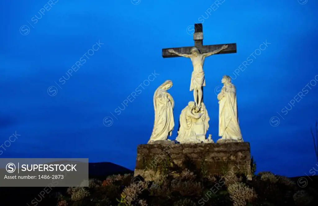 Low angle view of the statue of Jesus Christ near an abbey, Mount Melleray Abbey, County Waterford, Ireland