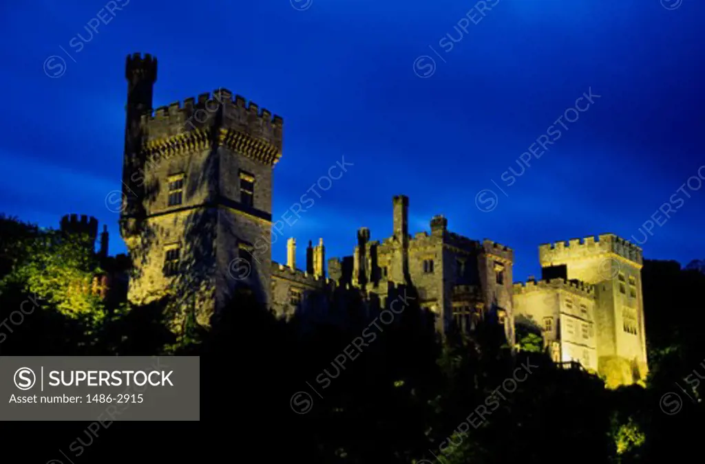 Low angle view of a castle lit up at night, Lismore Castle, County Waterford, Ireland