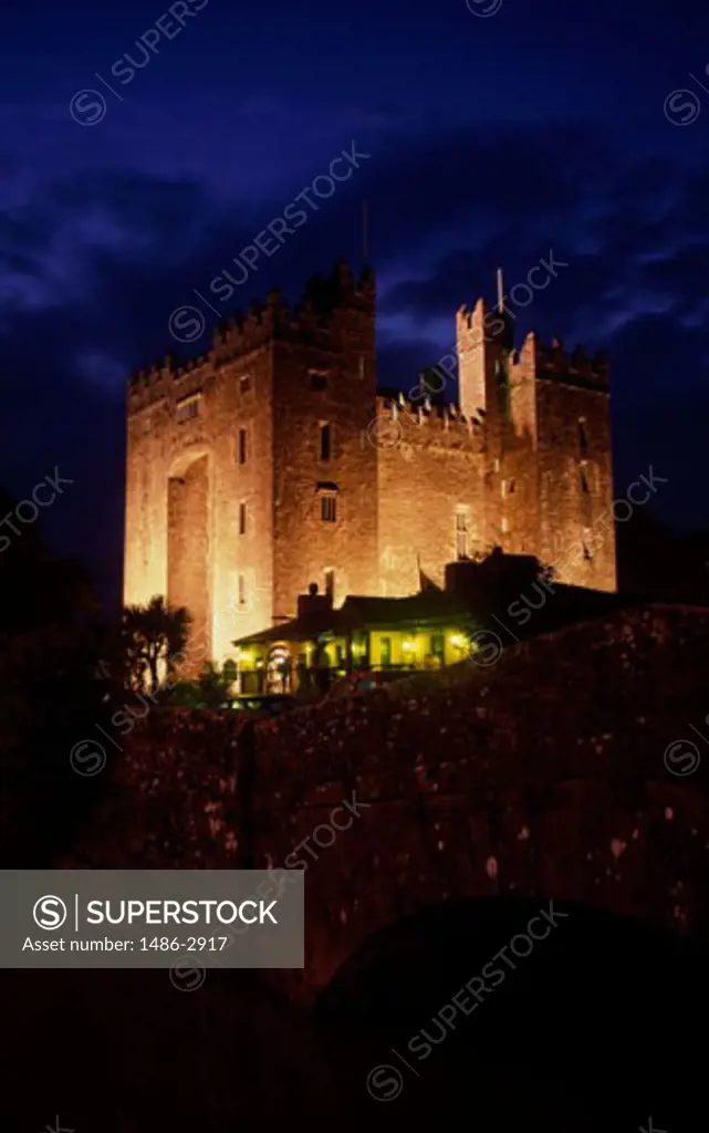 Low angle view of a castle lit up at night, Bunratty Castle, Bunratty, Ireland