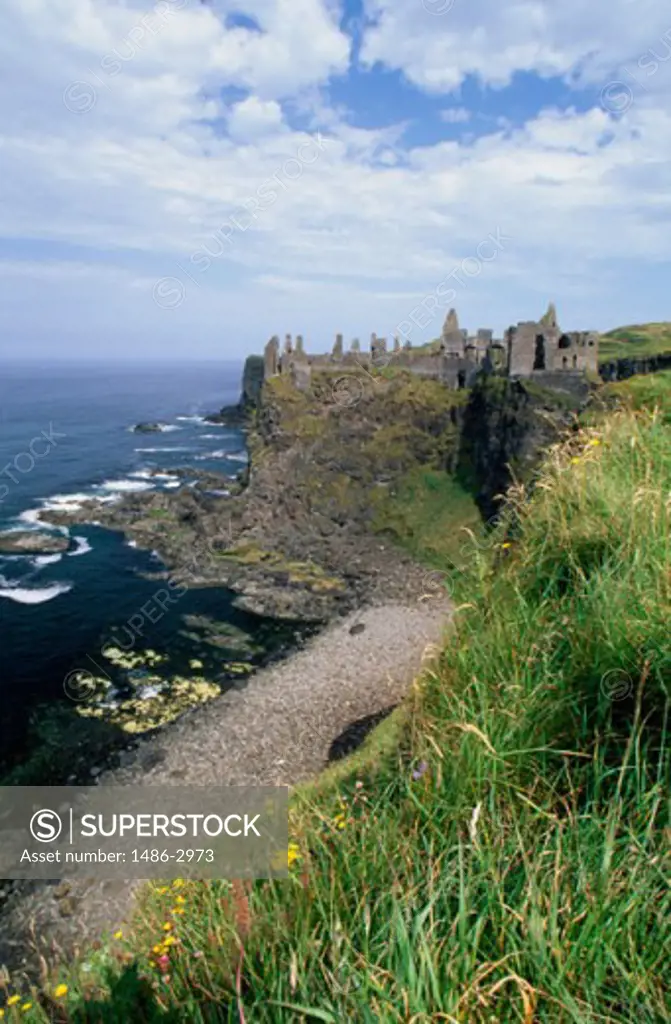 Old ruin of a castle, Dunluce Castle, County Antrim, Northern Ireland