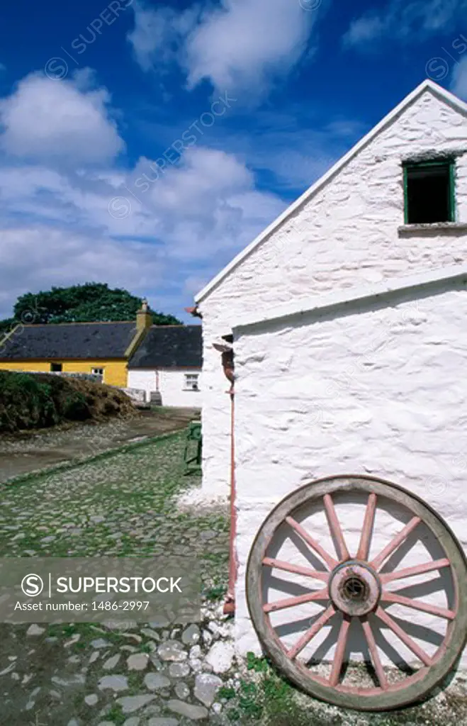 Wheel leaning against a wall, Killarney, County Kerry, Ireland