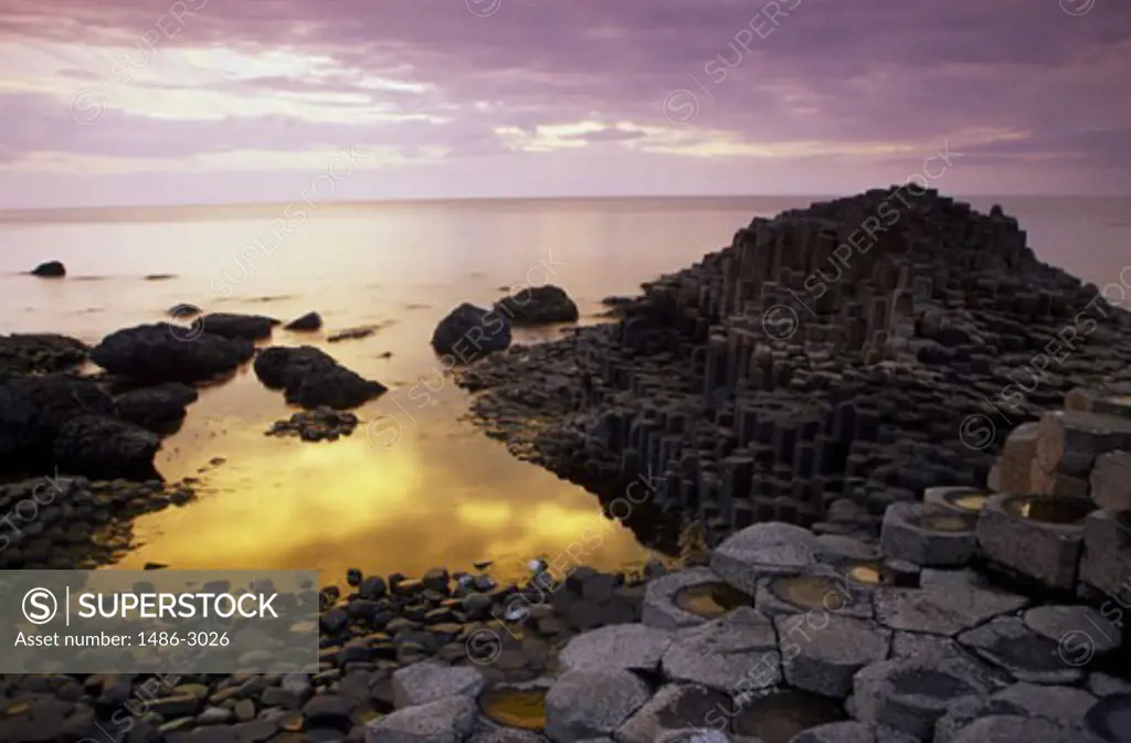 Reflection of clouds in water, Giants Causeway, Bushmills, County Antrim, Northern Ireland