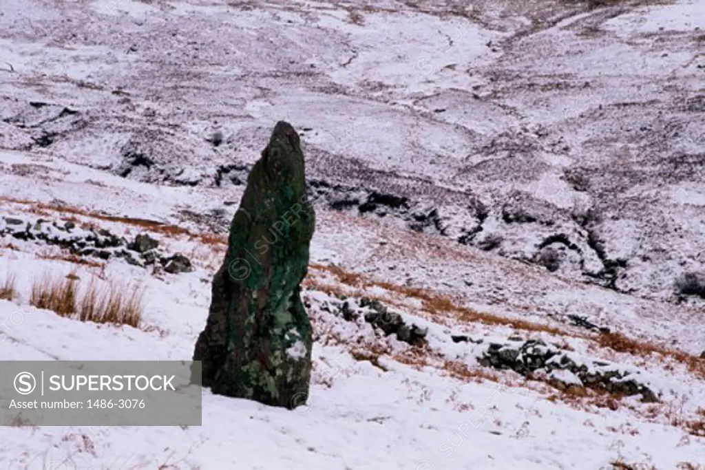 Rock on a snow covered landscape, Nire Valley, County Waterford, Ireland
