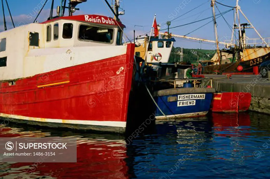 Fishing boats docked at a port, Kinsale, Ireland