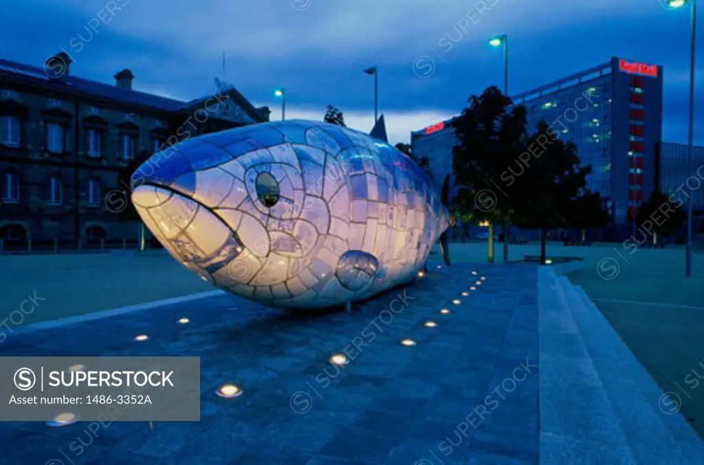 Big Fish sculpture in front of buildings, Belfast, Northern Ireland