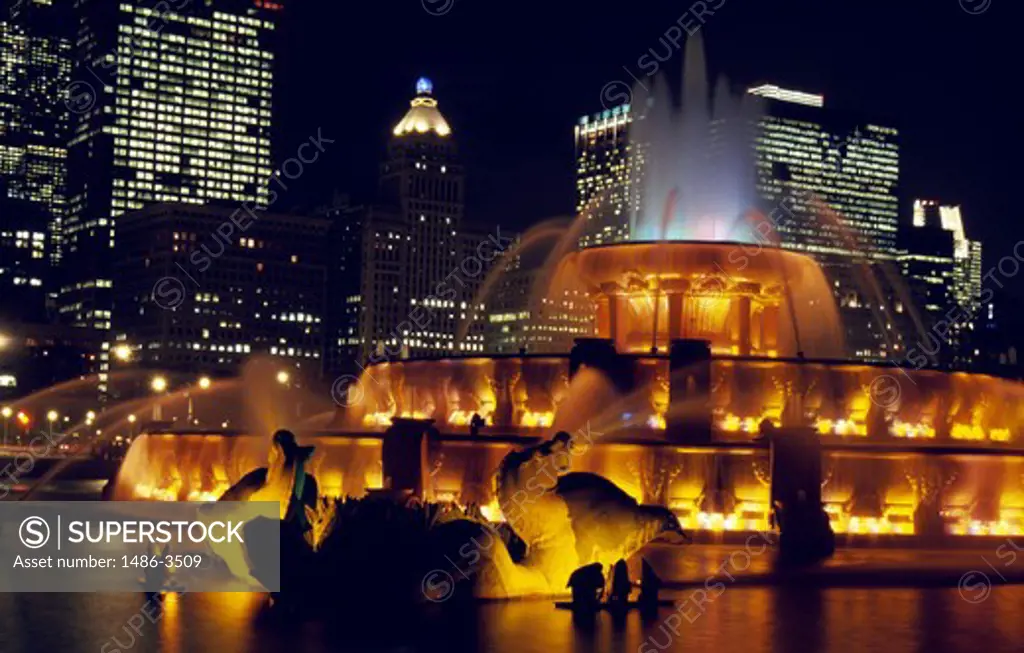 USA, Illinois, Chicago, Grand Park, Buckingham Fountain illuminated during night