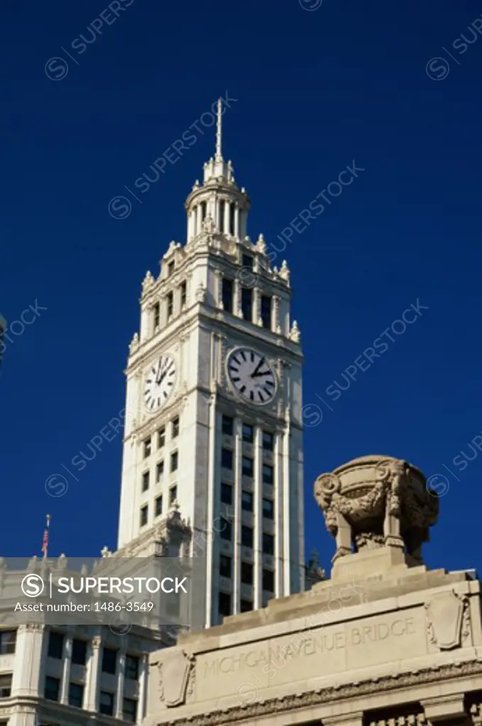 Low angle view of a clock tower, Wrigley Building, Chicago, Illinois, USA