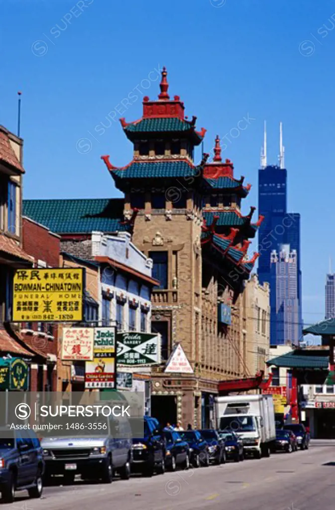 Cars parked in front of stores, Chinatown, Chicago, Illinois, USA