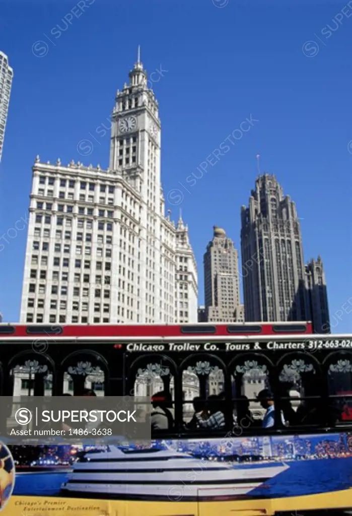 Tram in front of a building, Wrigley Building, Chicago, Illinois, USA