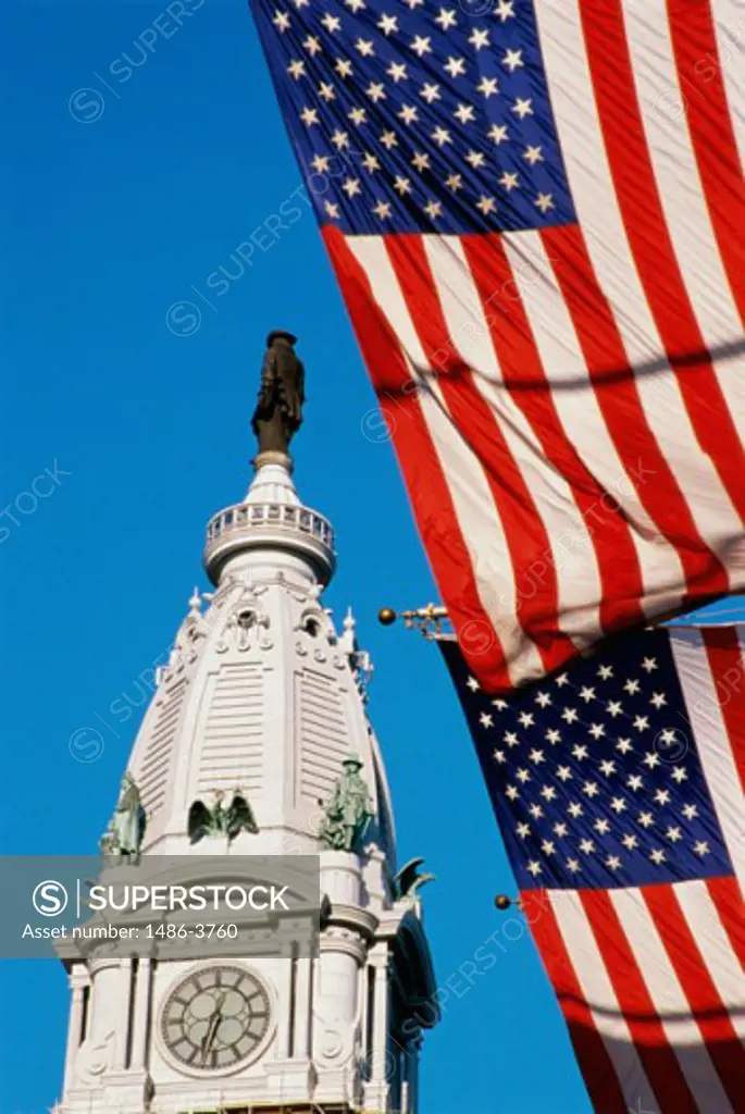 Low angle view of American flags at City Hall, Philadelphia, Pennsylvania, USA