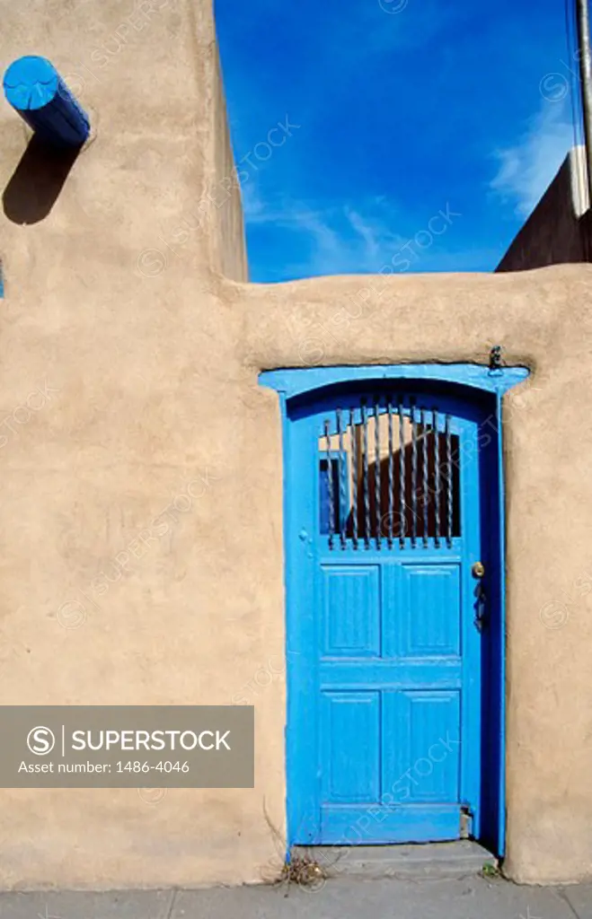 USA, New Mexico, Ranchos de Taos, Casa Benavides Bed and Breakfast, blue door