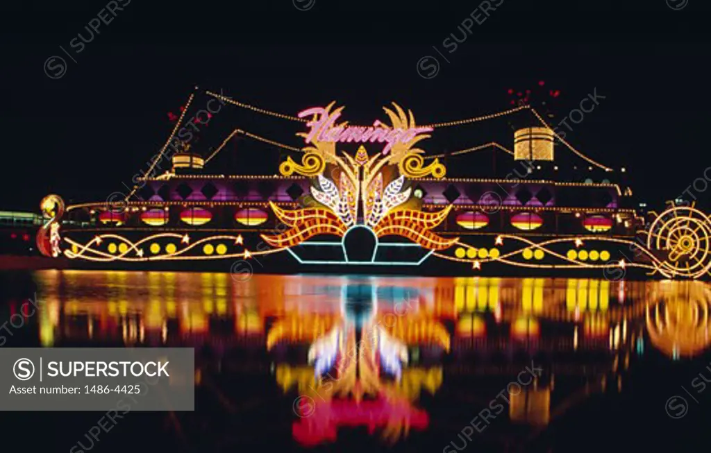 USA, Missouri, Kansas City, illuminated Flamingo Casino by night