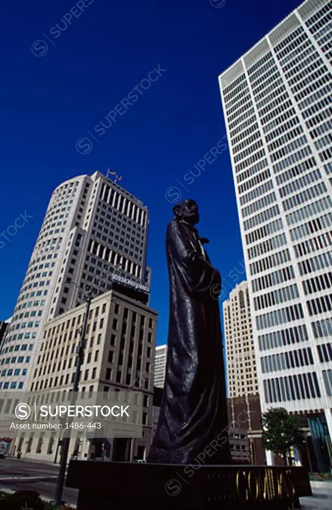Statue in front of buildings, Comidas Statue, Detroit, Michigan, USA