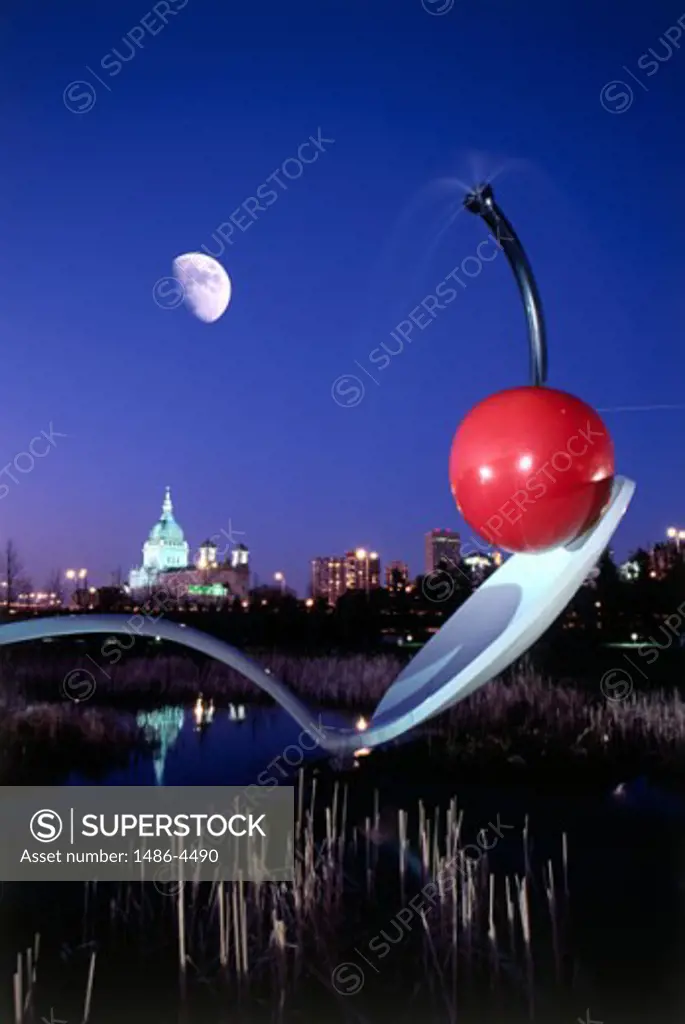 Sculpture in a garden at night, Spoonbridge and Cherry, Minneapolis Sculpture Garden, Minneapolis, Minnesota, USA