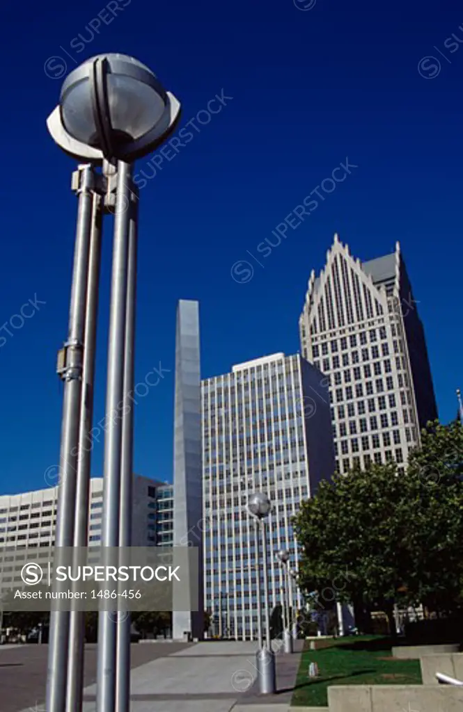 Street lights in front of buildings, Comerica Tower, Municipal Center, Detroit, Michigan, USA